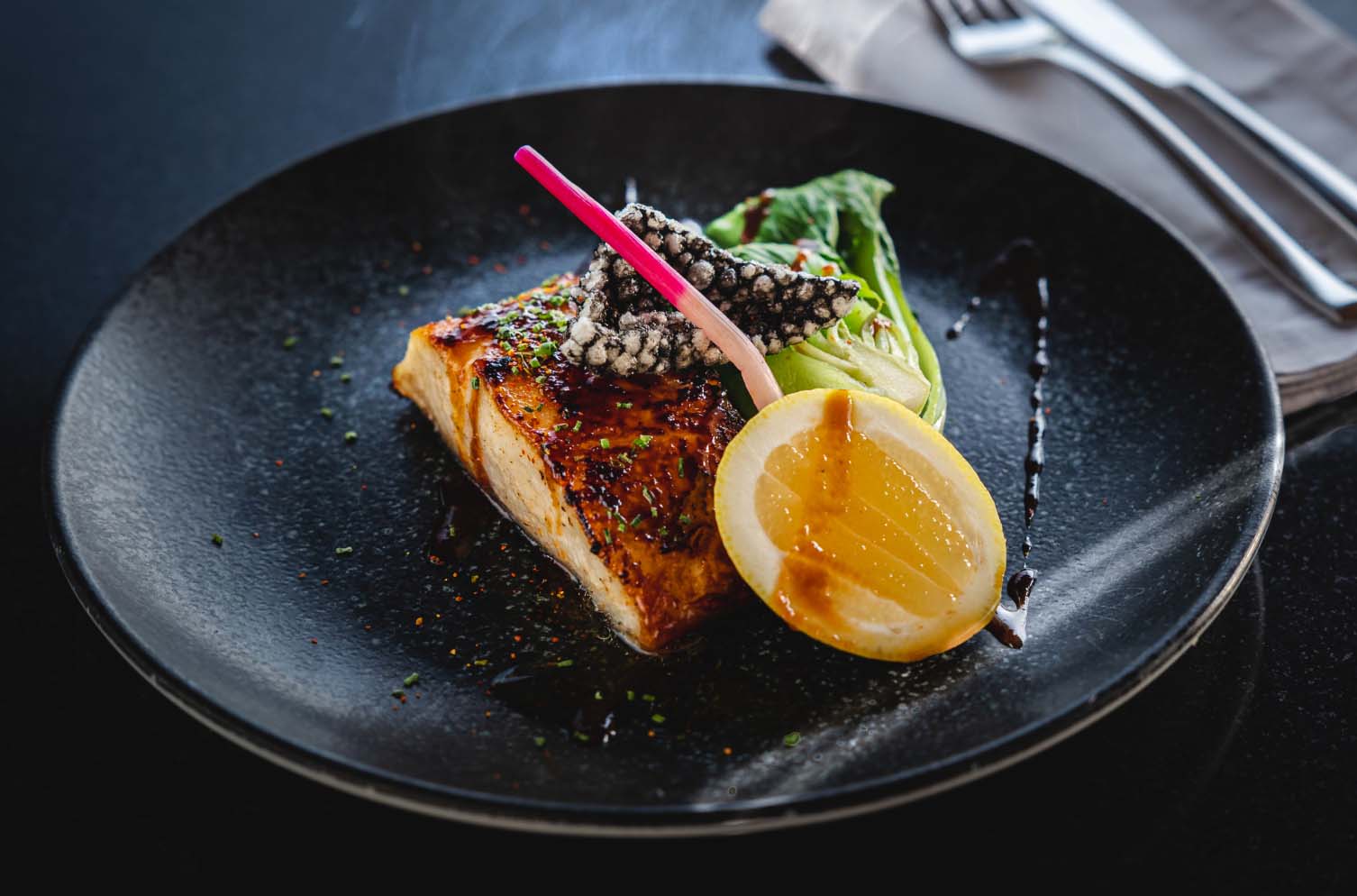 The Miso Crusted Black Cod and Bok Choy from the Feeling Koi Maldives menu, fine dining in the Maldives.