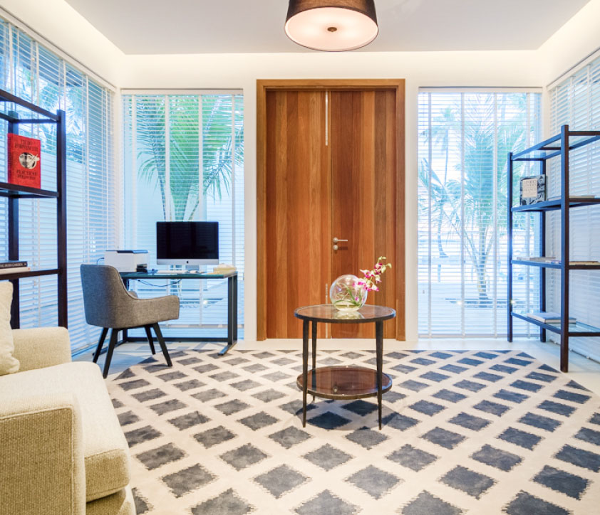 The private office space with floor to ceiling windows at the Amilla Estate, our Maldives Mansion.