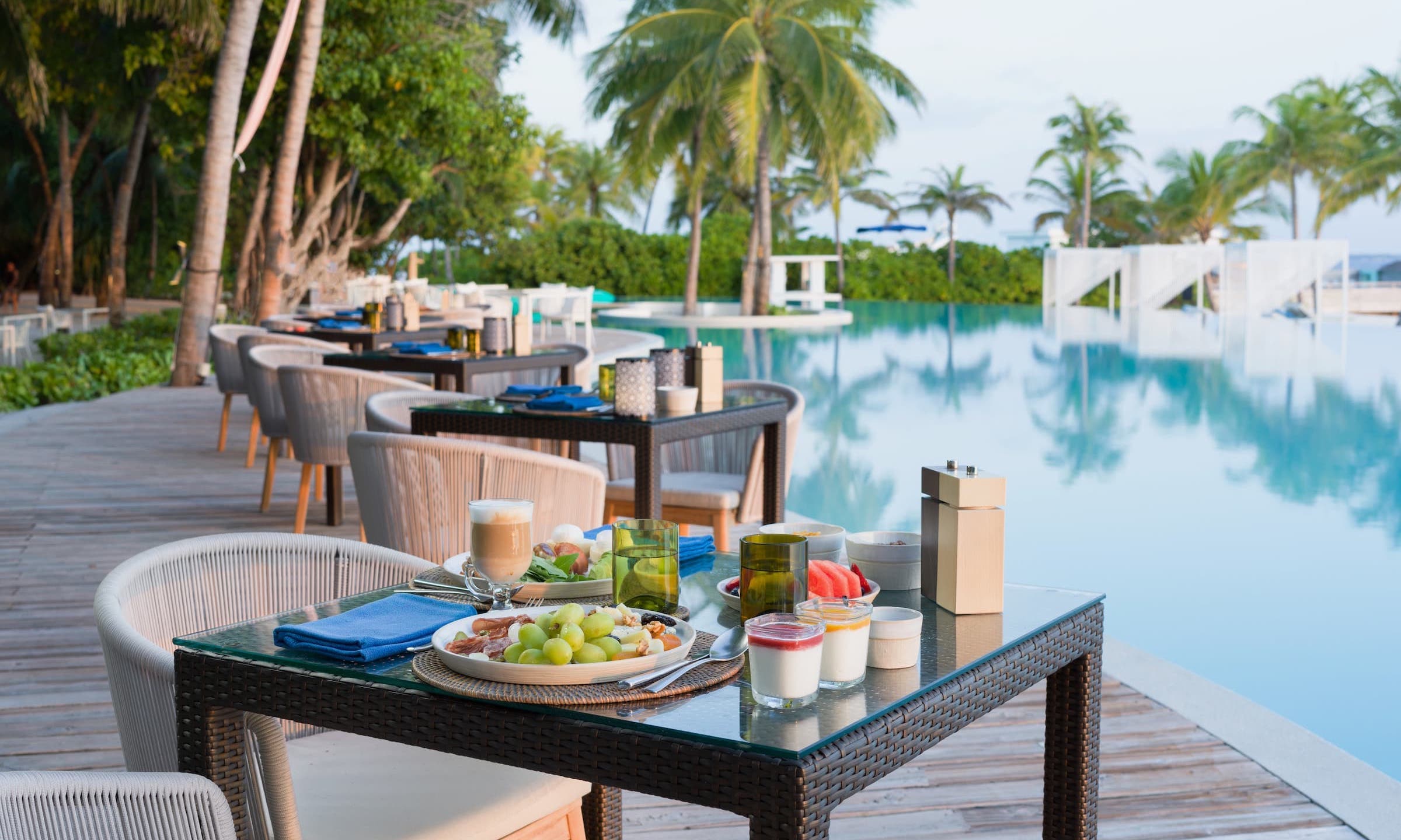 Dining poolside at Barolo Grill - An Italian restaurant in the Maldives