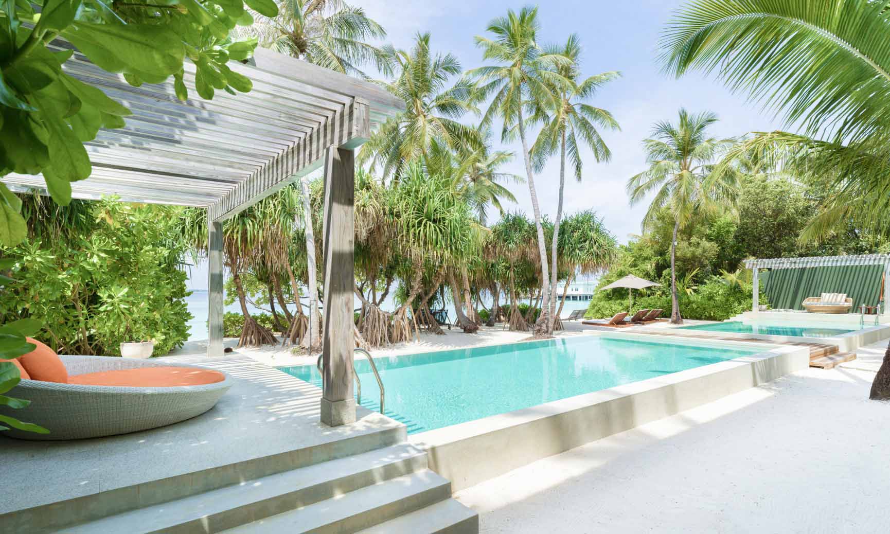 The days beds and 2 private freshwater pools with private beach access at our Great Beach Residence Maldives.