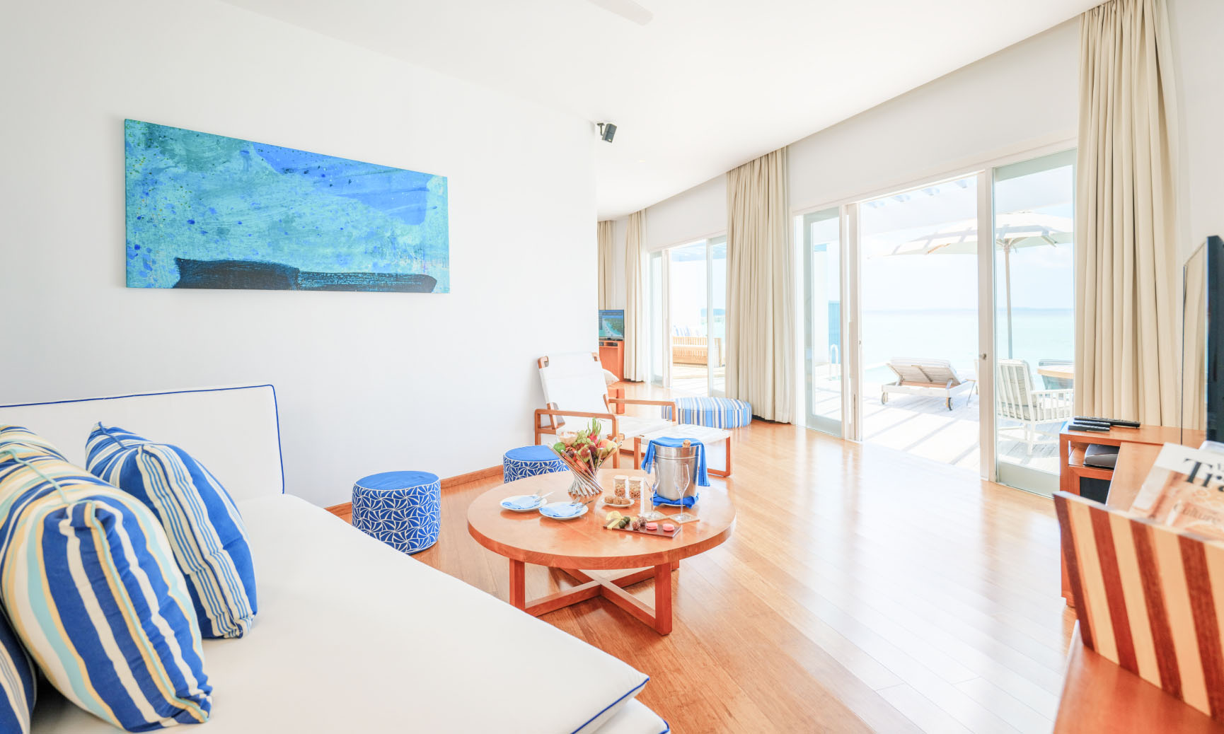 The living room inside of our 2 bedroom water villa in the Maldives.