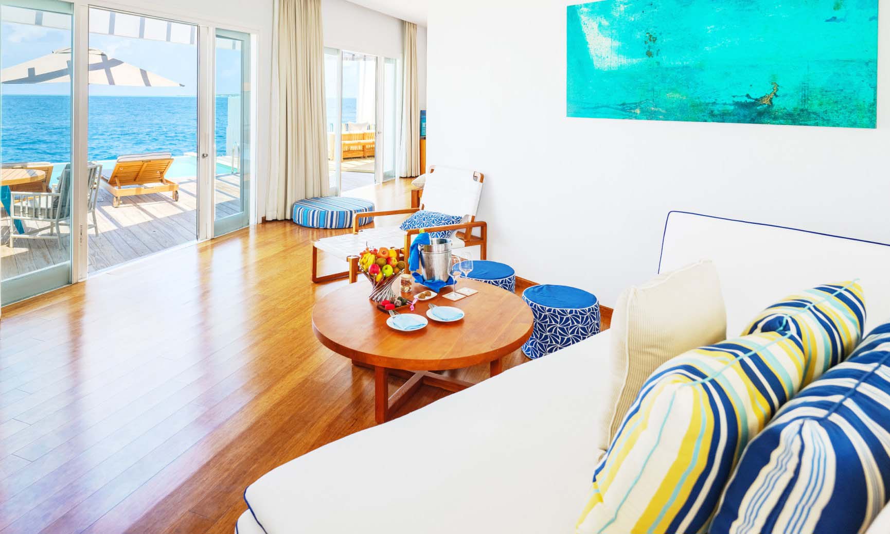 The living room inside of our Maldives Villa with private pool.